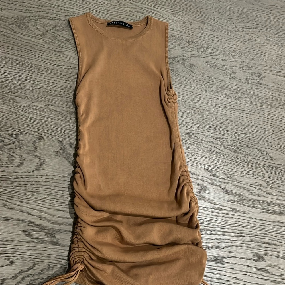 Lioness knit dress with ricking size small